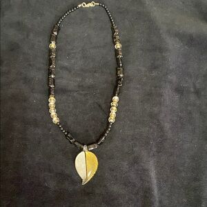 Elegant Black and Gold Leaf Pendant Necklace